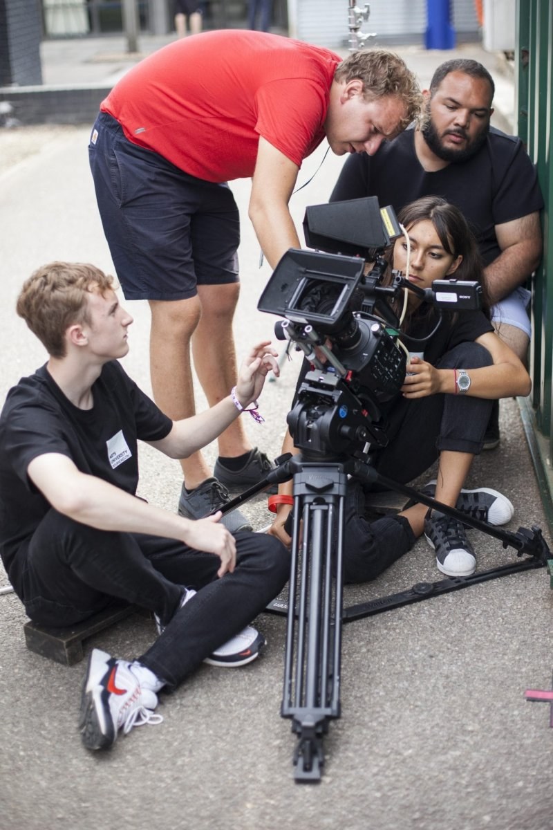 Students working with a camera