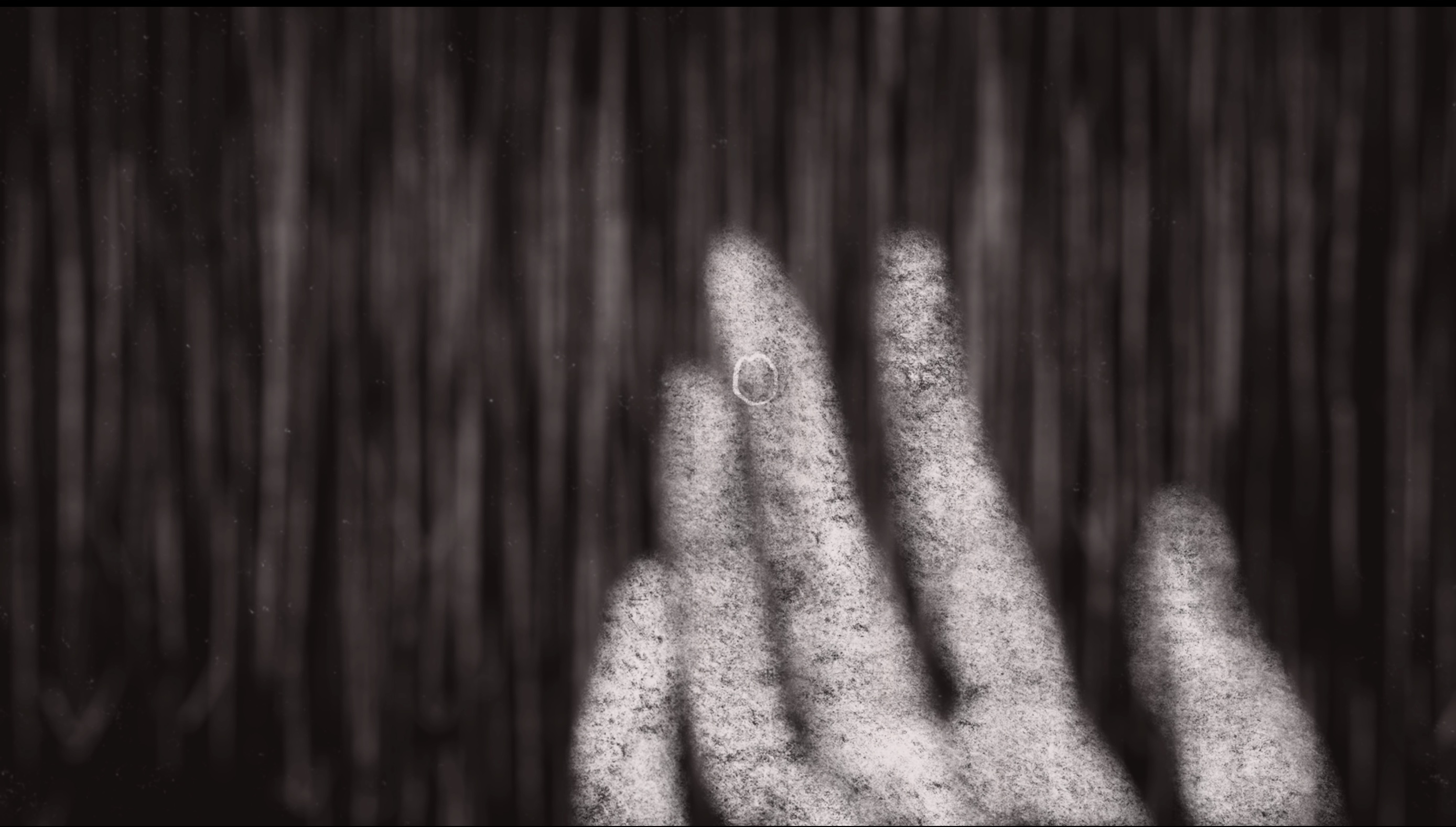 Hand pressed against vertical metal bars casting shadows, black and white image with strong contrast and dramatic lighting.