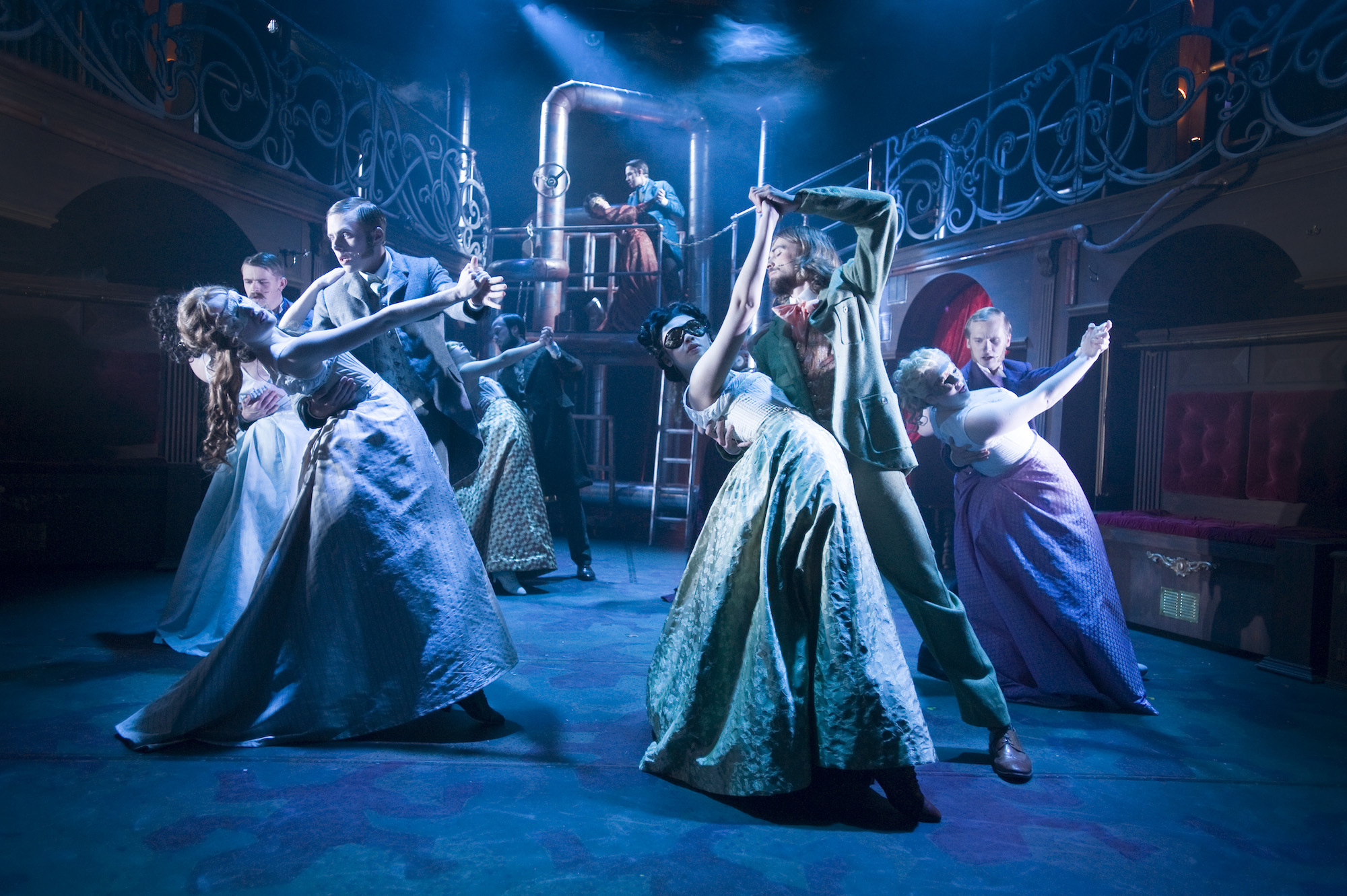 Several BA (Hons) Acting students performing a ballroom scene in a performance of "Masque Macabre". Several couples are in the middle of a waltz.