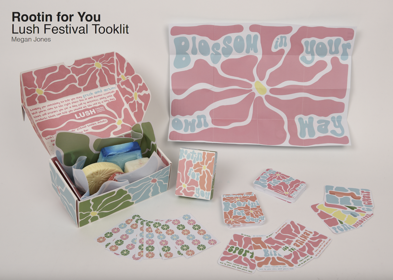 Packaging design for a Lush product called "Rootin' for You". The box is open showing various Lush products, with a deck of cards laid out in front of it and a poster. Text reading "Blossom in your own way" appears on the poster.