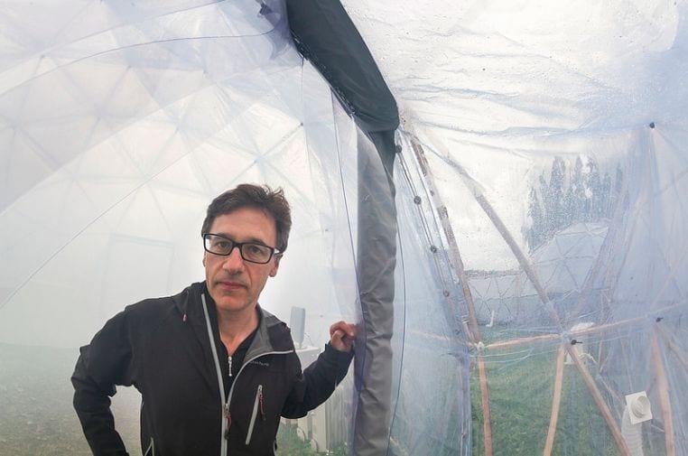 Headshot of M Pinksy inside a plastic dome.