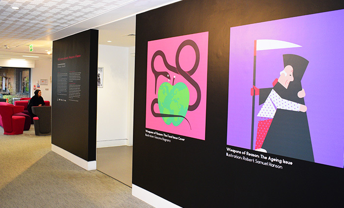 Gallery walls with illustrations (a snake about to eat a large apple, an old man hugging the Grim Reaper).
