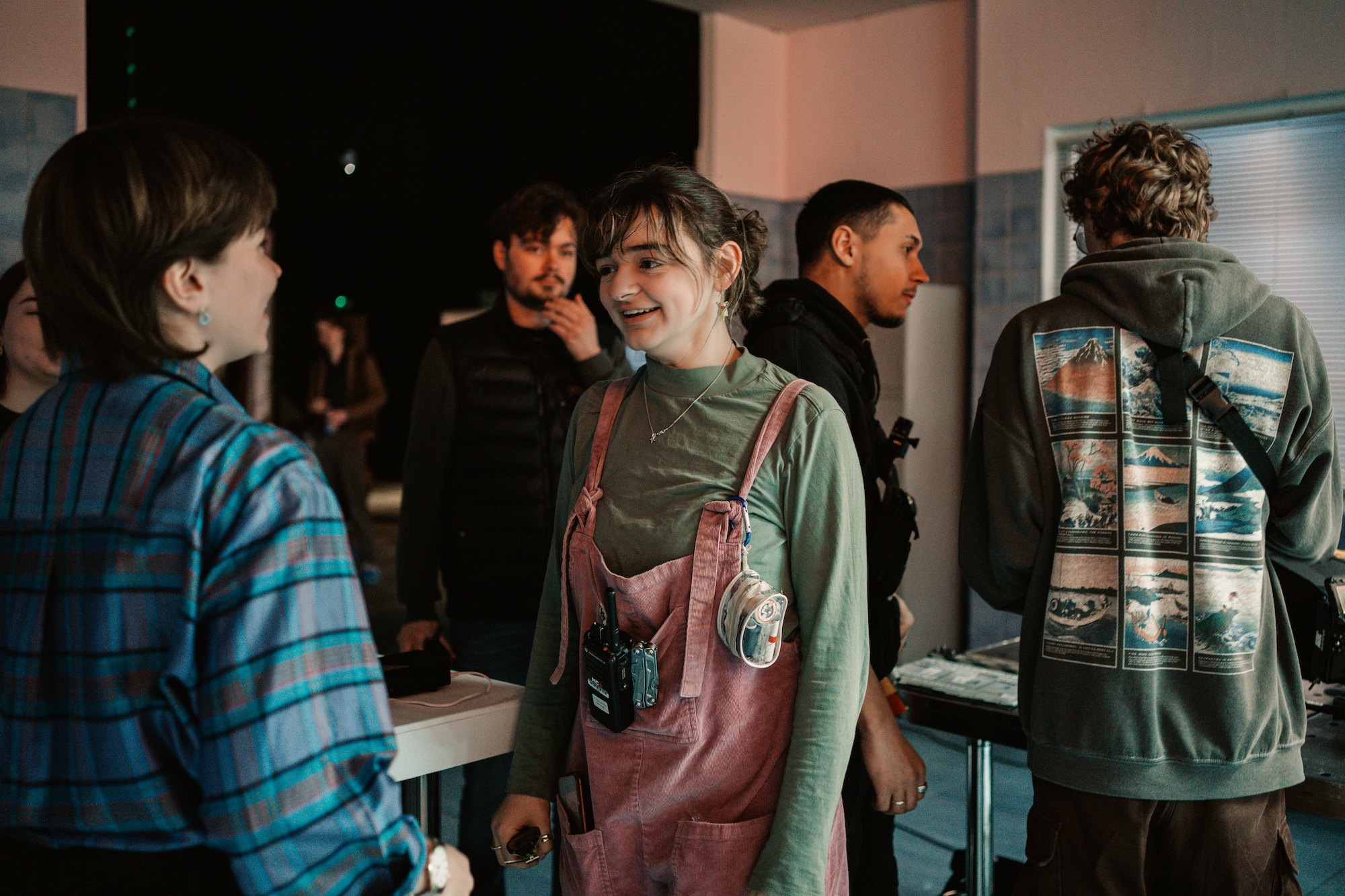 BA (Hons) Film Production student E Mainard talking with crew members on the set of "Mourning Glories".