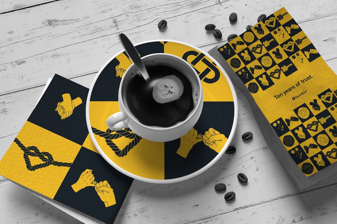 Coffee shop advertising branding for the ’10 Years of Trust’ campaign, yellow and black graphics.