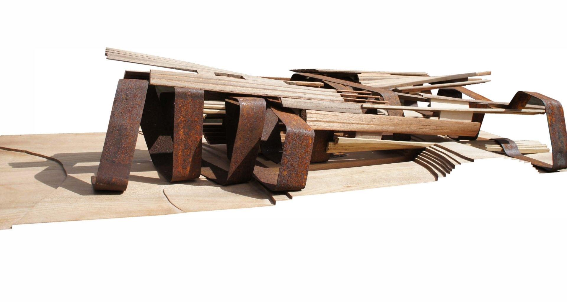 A collection of wooden and metal materials stacked