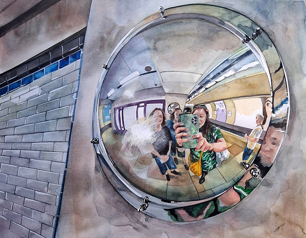 A convex mirror reflecting a group of people standing in a subway station. The scene includes a tiled wall, a partially visible platform, and the people holding a smartphone, with some in casual clothing.