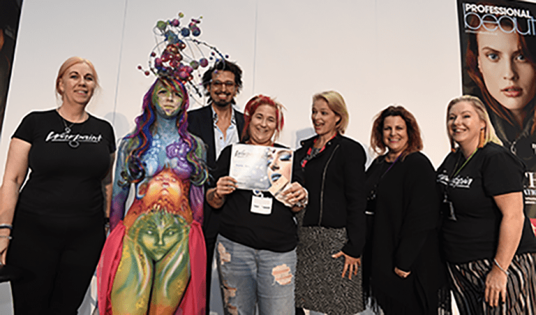 Michelle receives her award from competition judges