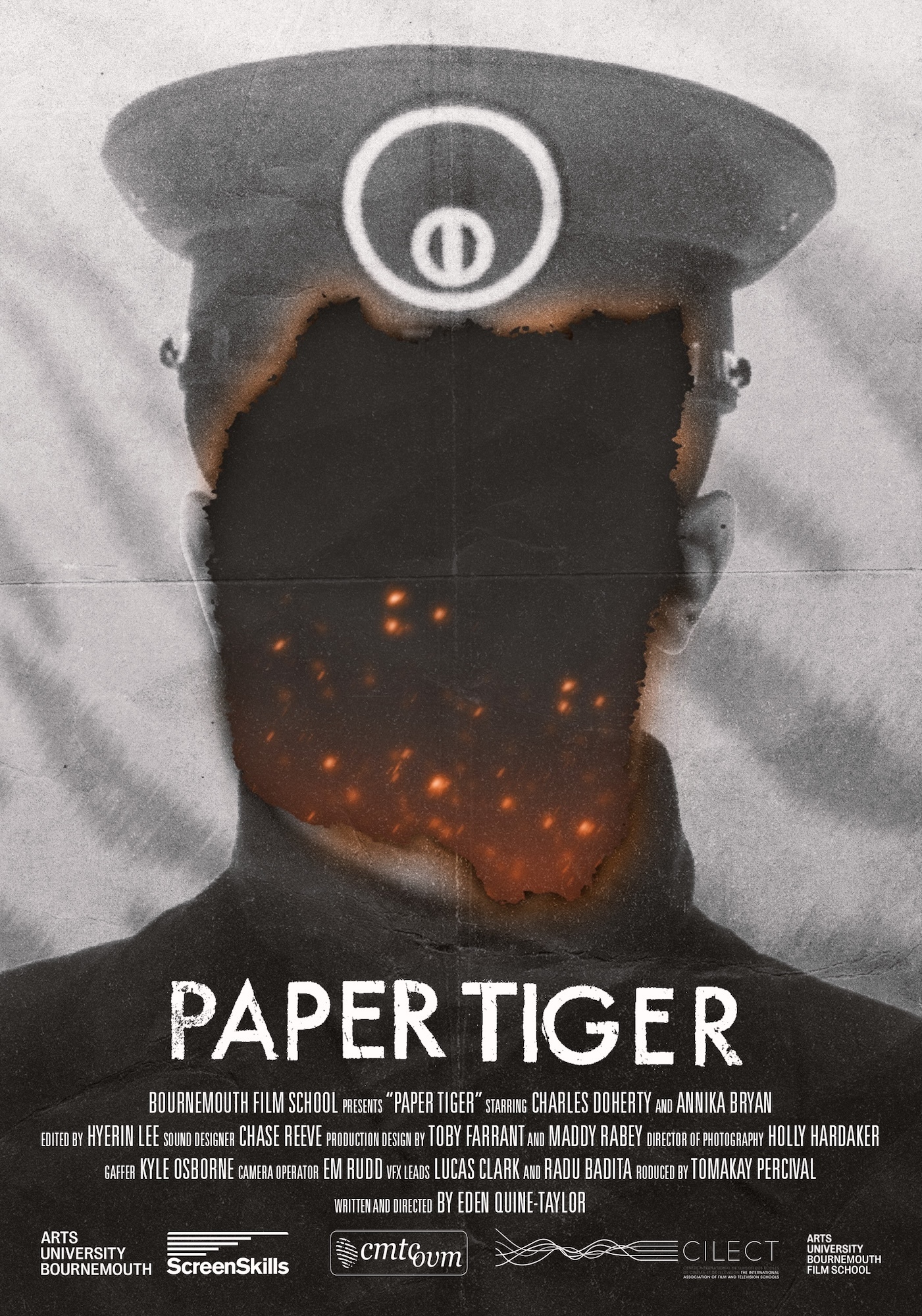 Film poster with figure in grey peaked cap, dark silhouette with orange glowing interior where face should be, white text below.