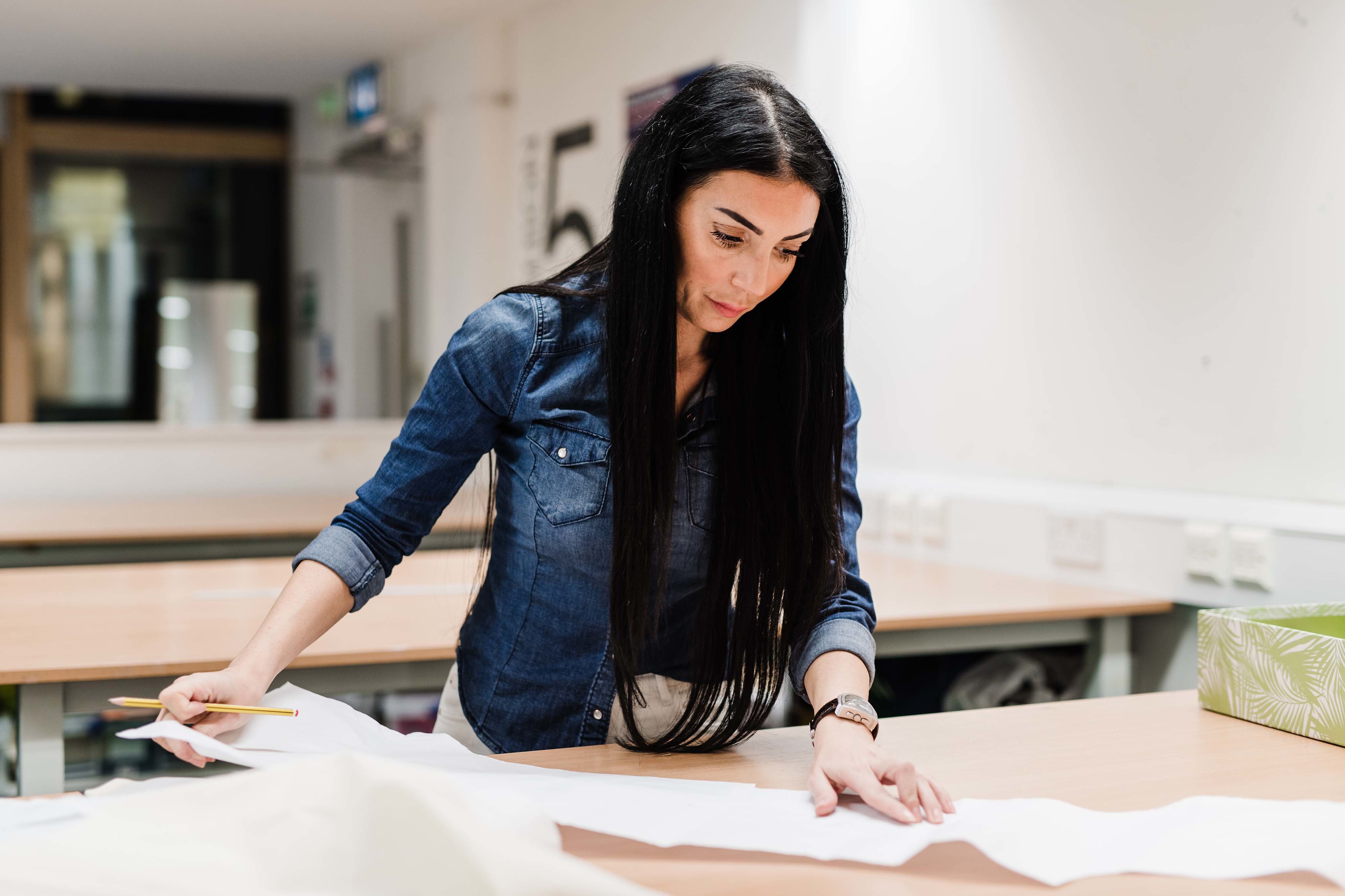 student in pattern cutting class