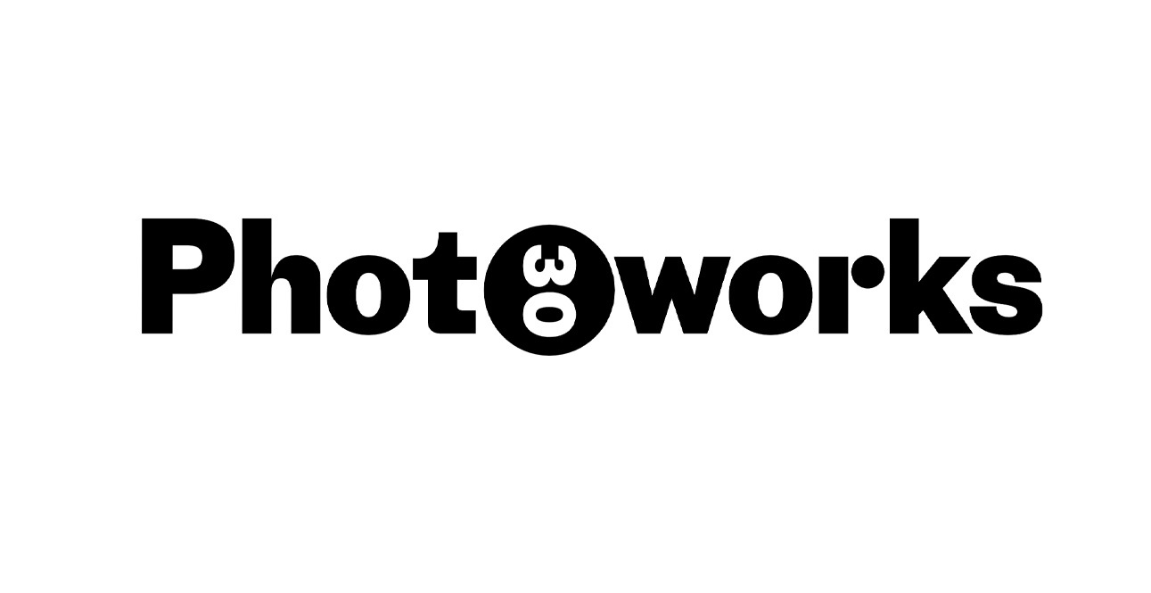 White banner with black text reading "Photoworks". The number 30 is inserted into the second O.