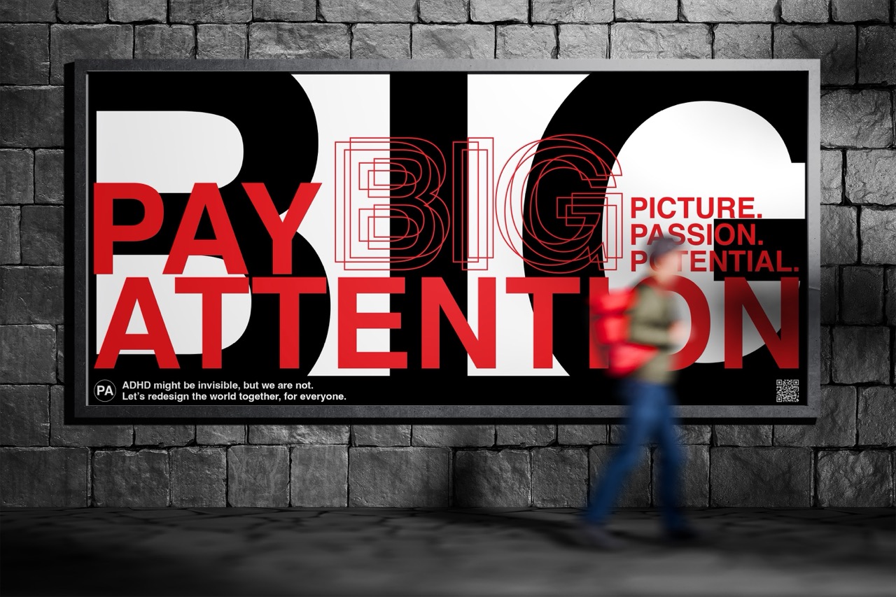 Bold mock-up billboard with 'pay attention' in red capitals and 'BIG' behind it, person blurred walking in front.