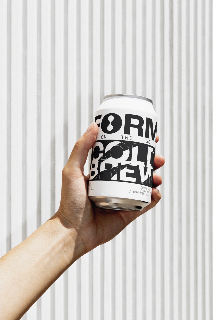 Can with 'Form Cold Brew' in abstract black and white typography, white background.