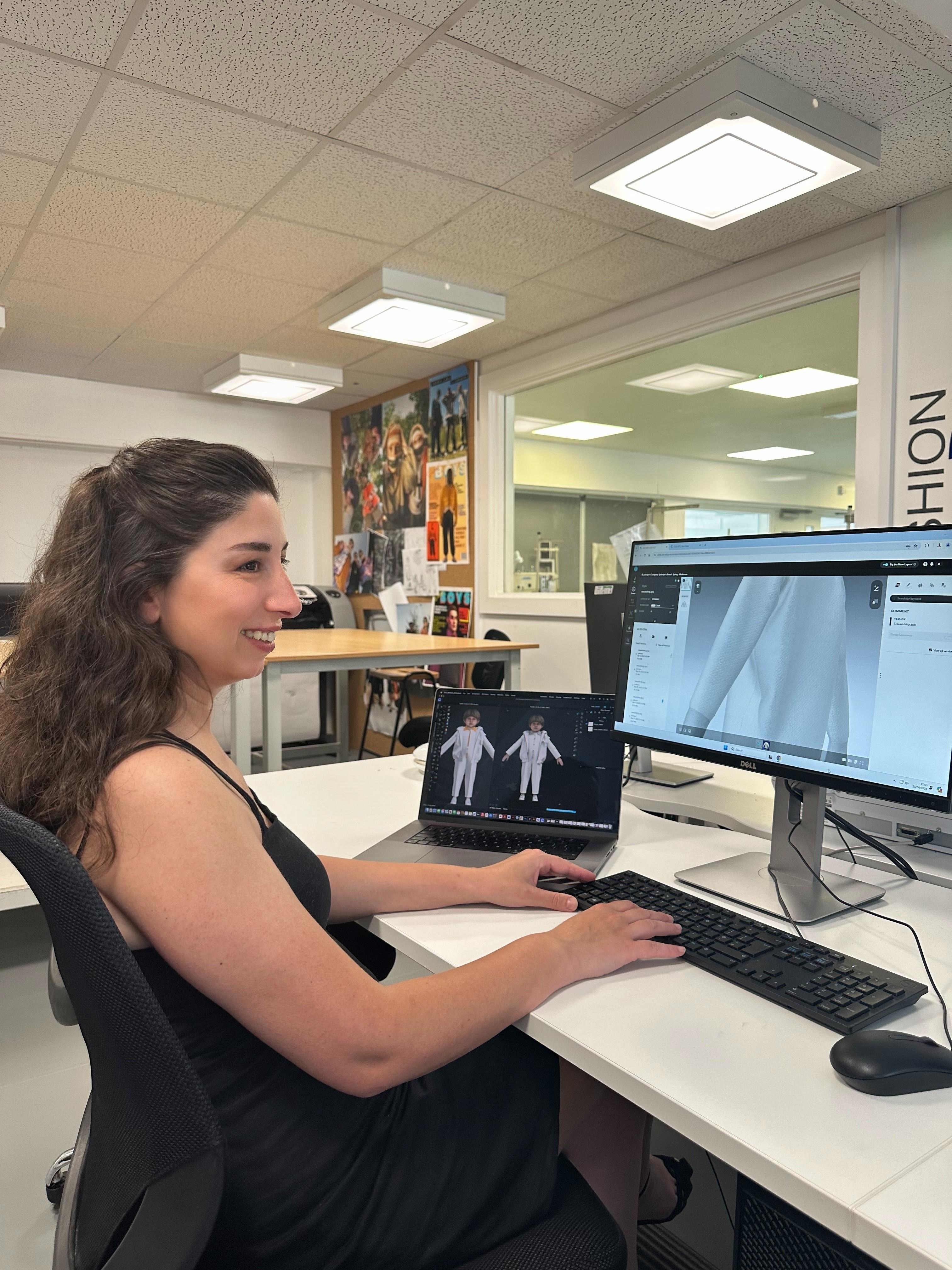 MA Digital Fashion Innovation student B. Aslan using CLO 3D software on AUB campus.