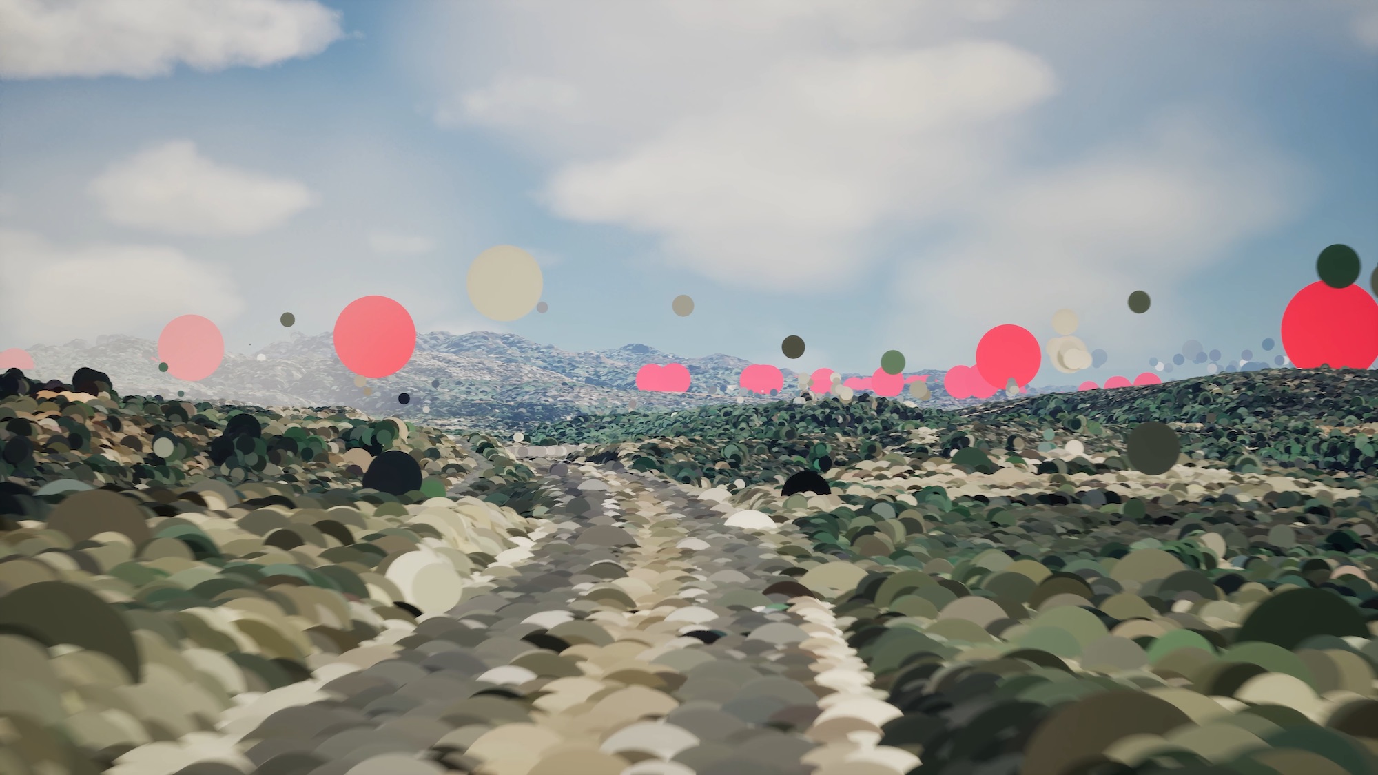 A winding dirt path traverses a hilly landscape dotted with abstract shapes in various colours, including red and pale grey. The sky above is partly cloudy, creating a scenic view of the natural surroundings.