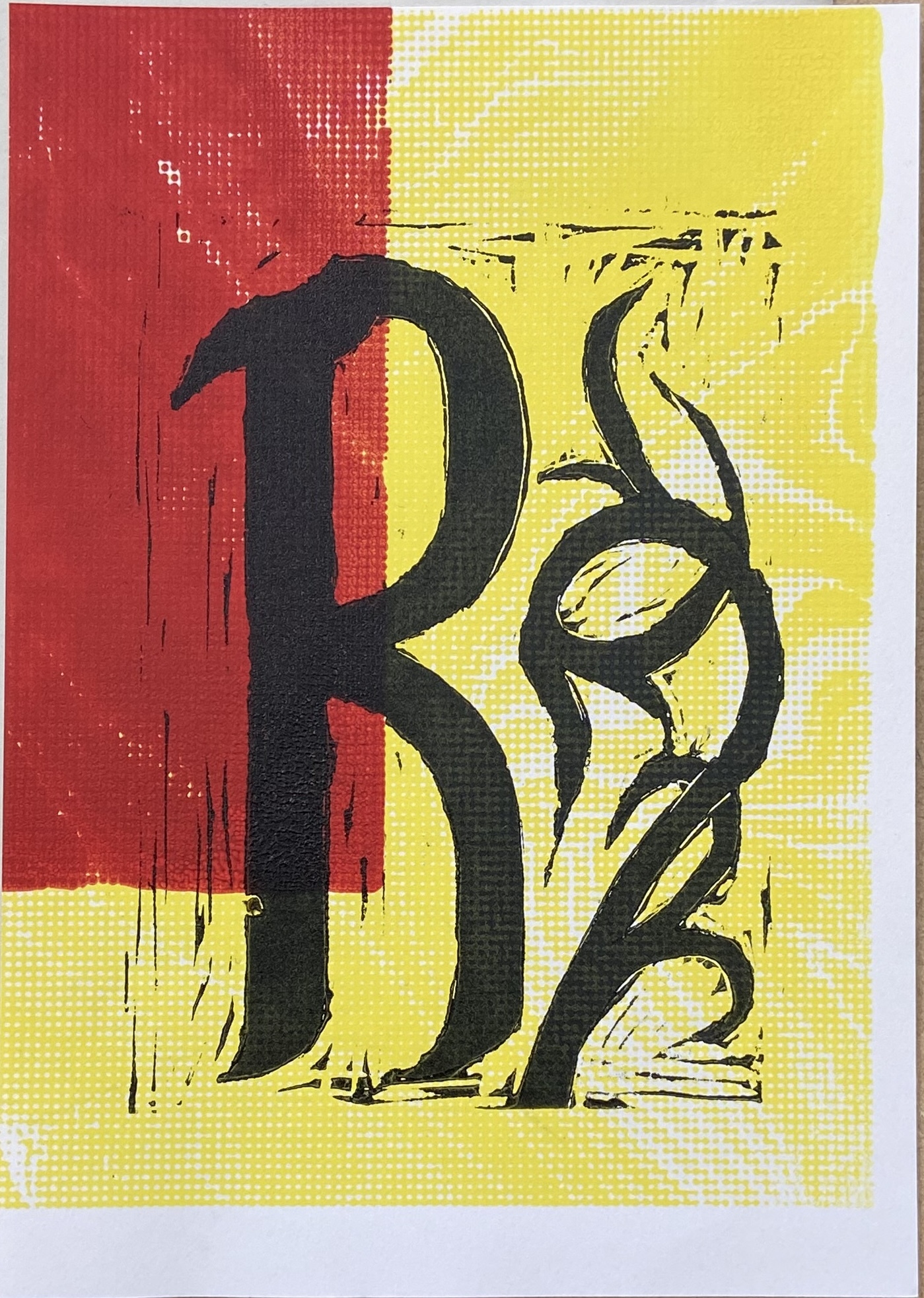 Lino art with the letter 'R' in black and intricate pattern, yellow and red block background.