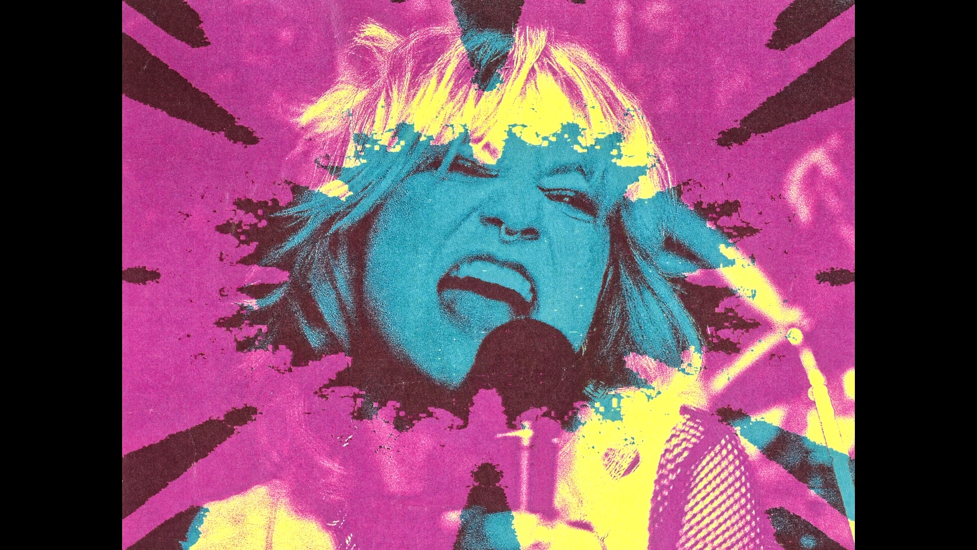 A close-up of a woman singing into a microphone, surrounded by vibrant pink and blue graphic effects. The image has an artistic and retro style, with dramatic splashes of colour emanating from her image.