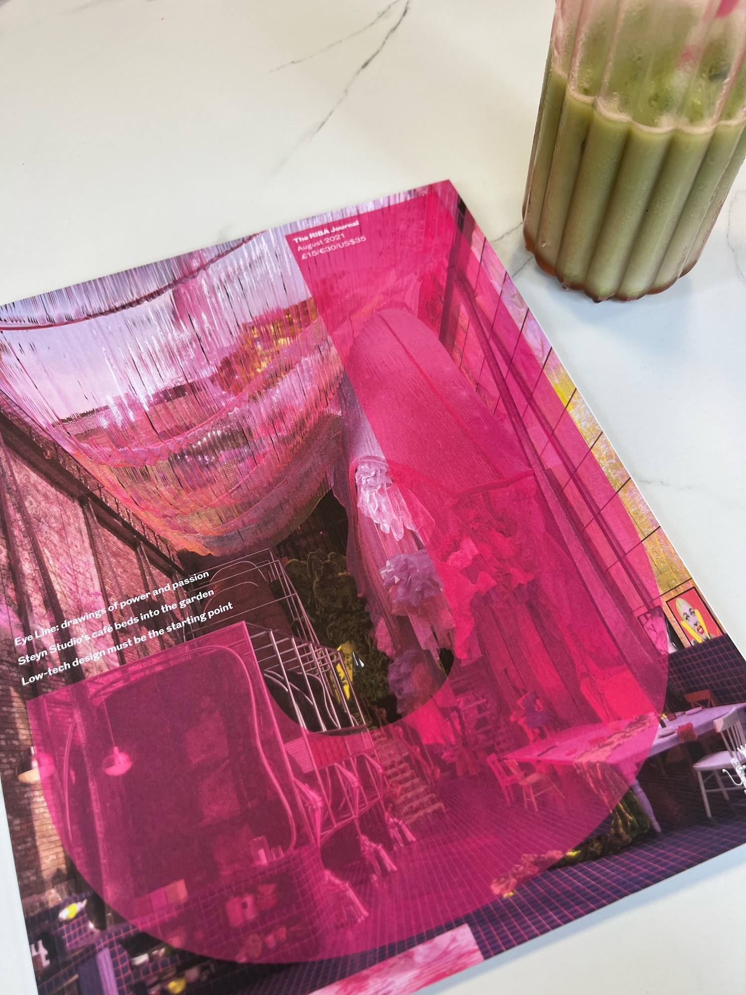 Front cover of an issue of the RIBA Journal, showing an abstract image and a bright pink J over it.