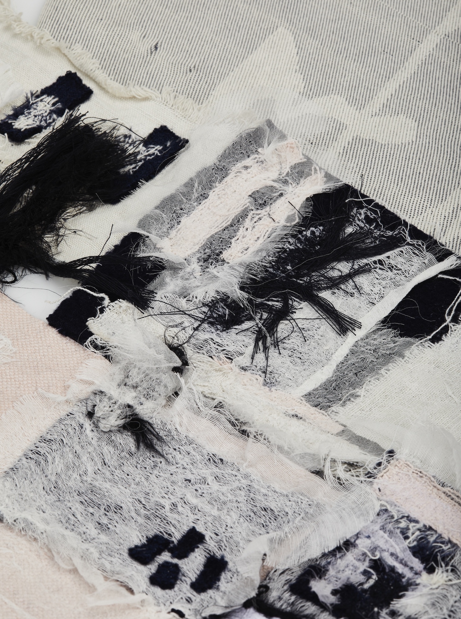 Samples of black and white fabric.