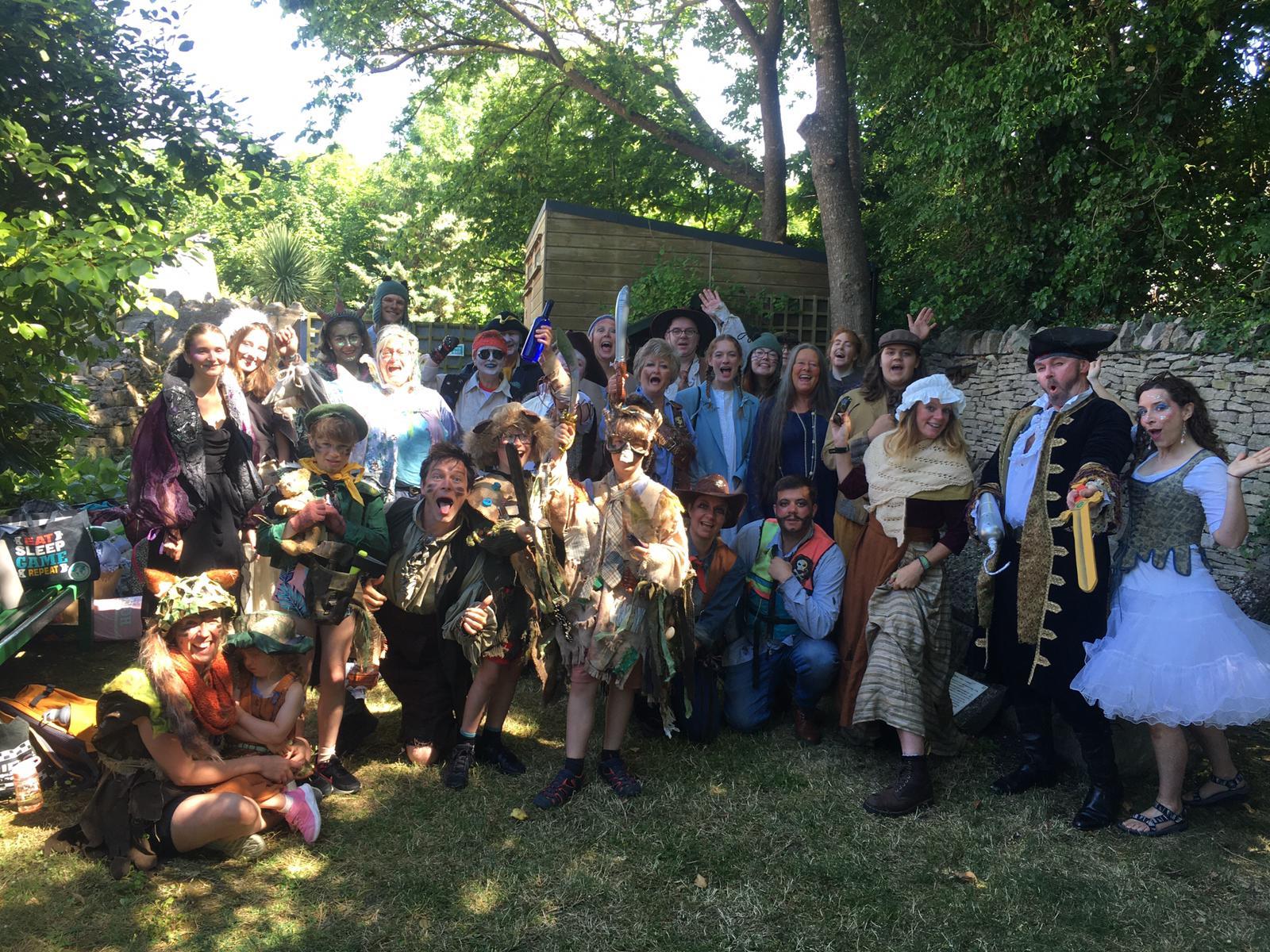 Cast and audience members of SISATA's Peter Pan pose for a photo.