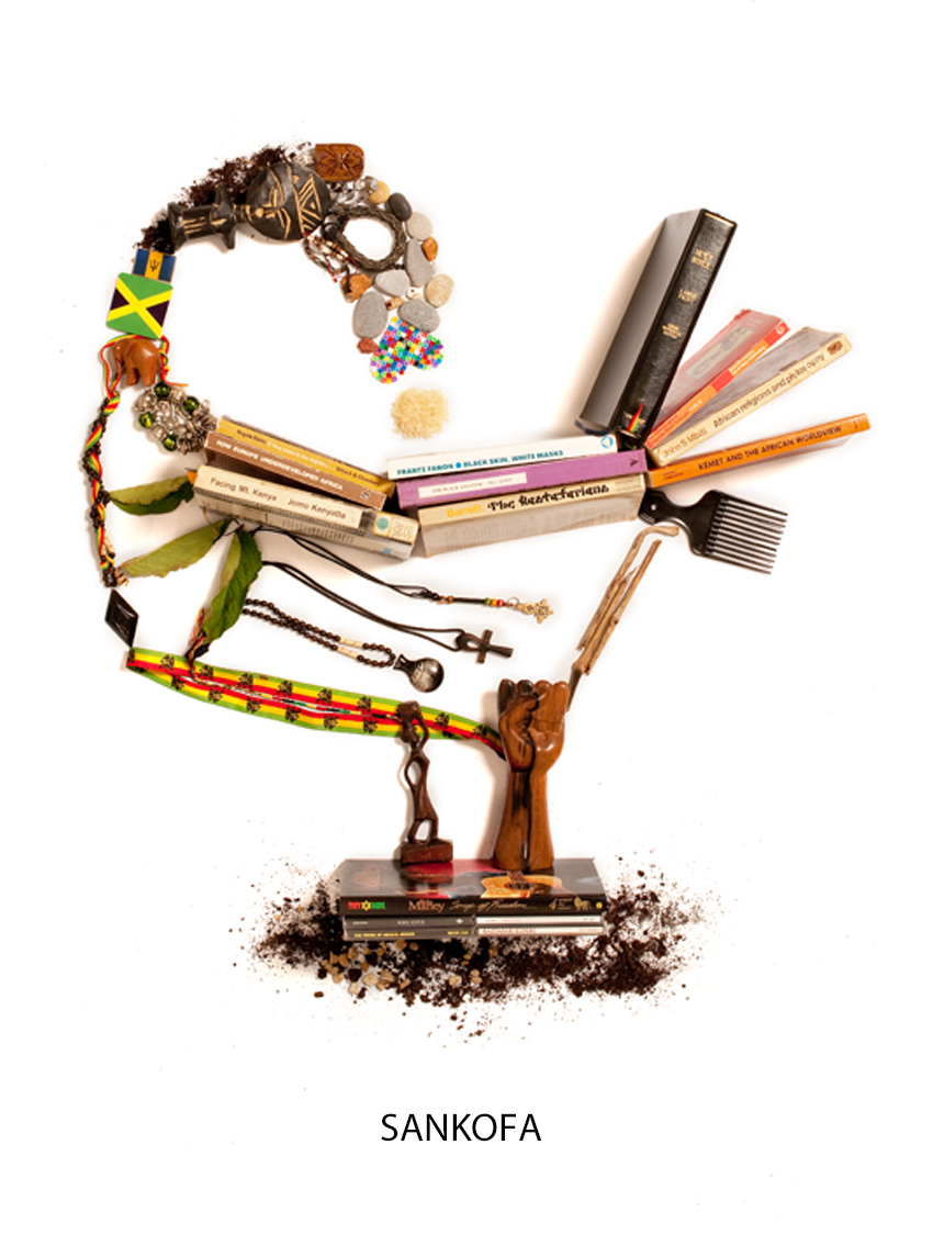A series of books, ornaments and objects arranged into a sculpture.