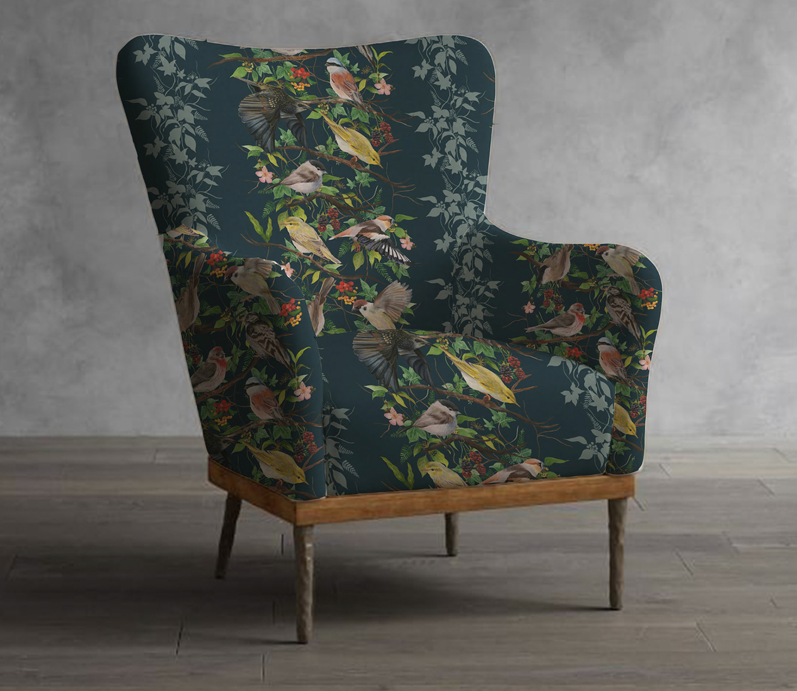 An armchair with upholstery patterned with images of various species of birds.