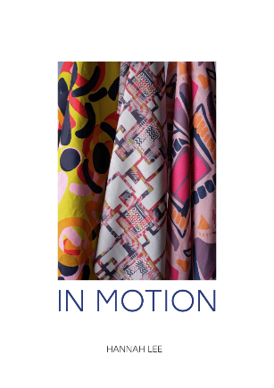 Book cover showing vertical strips of colourful patterned fabrics in yellow, pink, and geometric designs. Title "IN MOTION" below in black text.