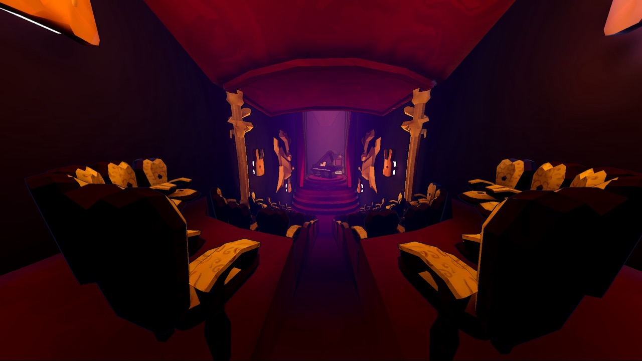 A purple-lit theatre interior with rows of seats facing a stage, framed by ornate columns and a red ceiling.
