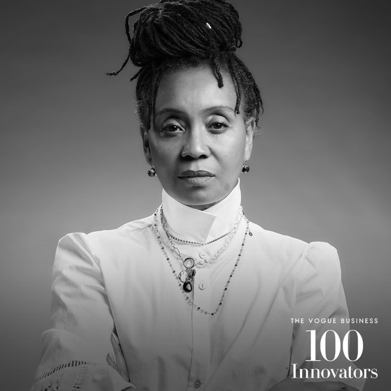 Black and white headshot of S D Lloyd, with a watermark for The Vogue Business 100 Innovators in the bottom-right corner.