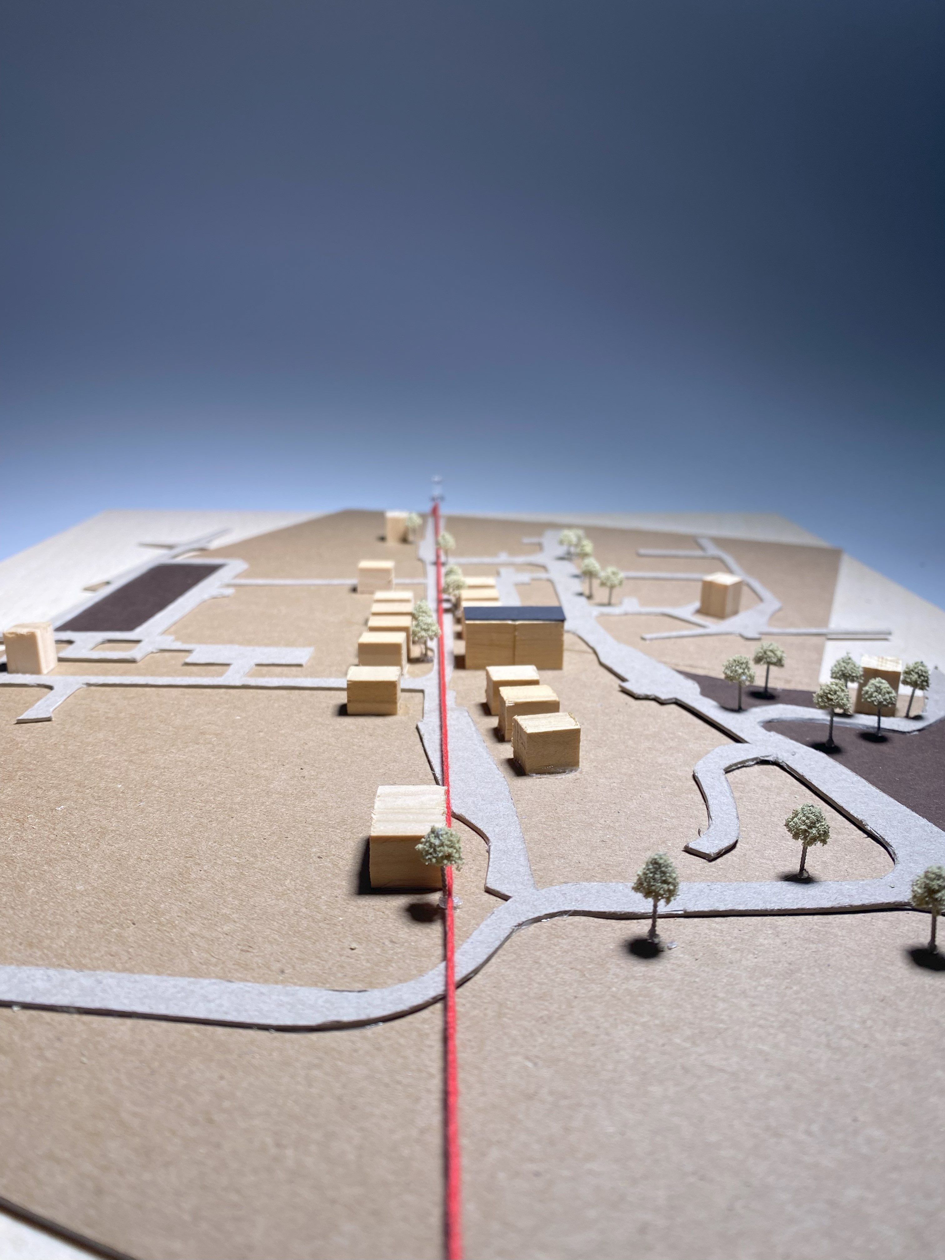 Final Portfolio project, site model map of Southampton high street, red string in-between wooden buildings.