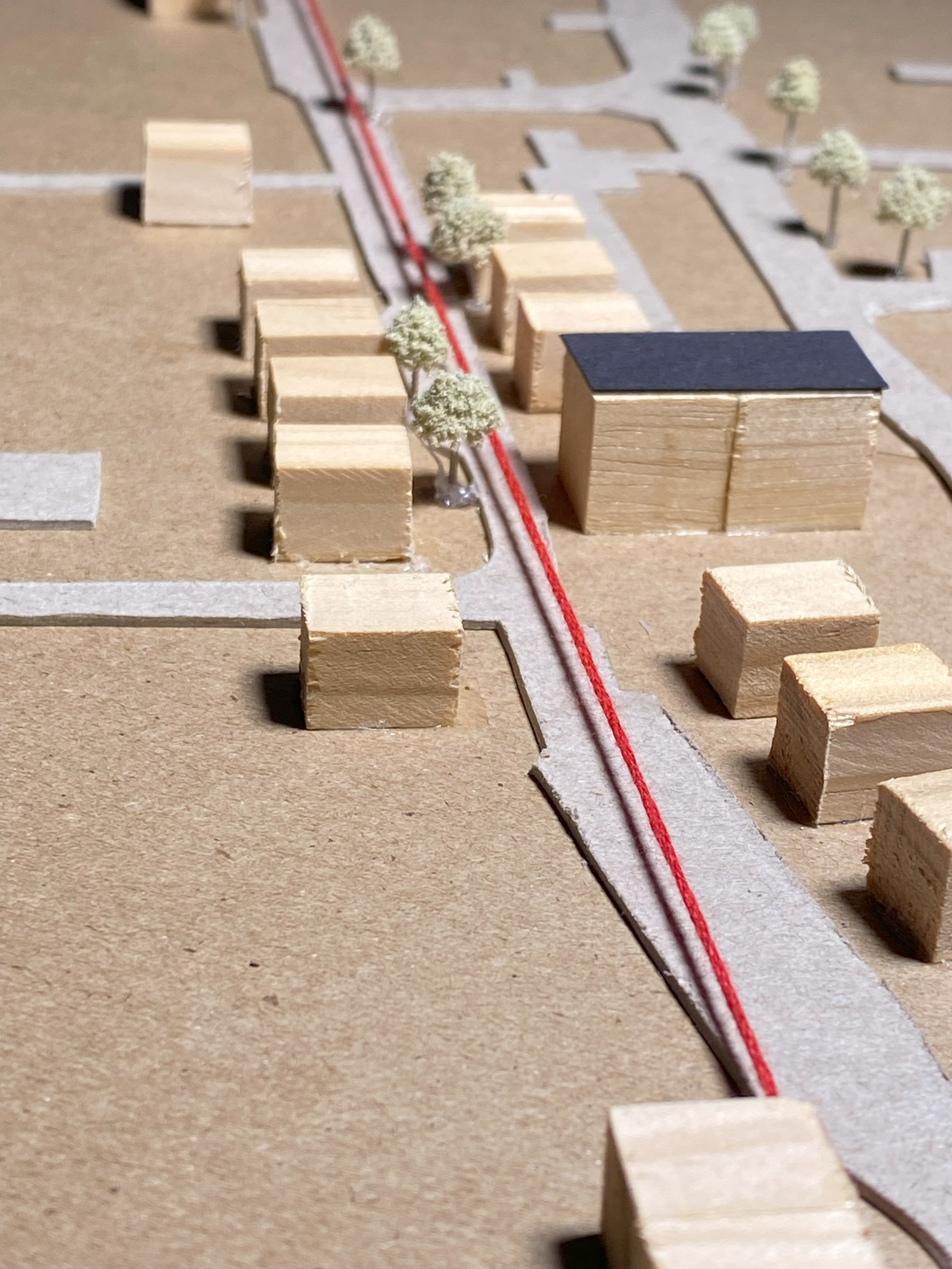 Final Portfolio project, site model map of Southampton high street and site close-up, red string in-between wooden buildings.