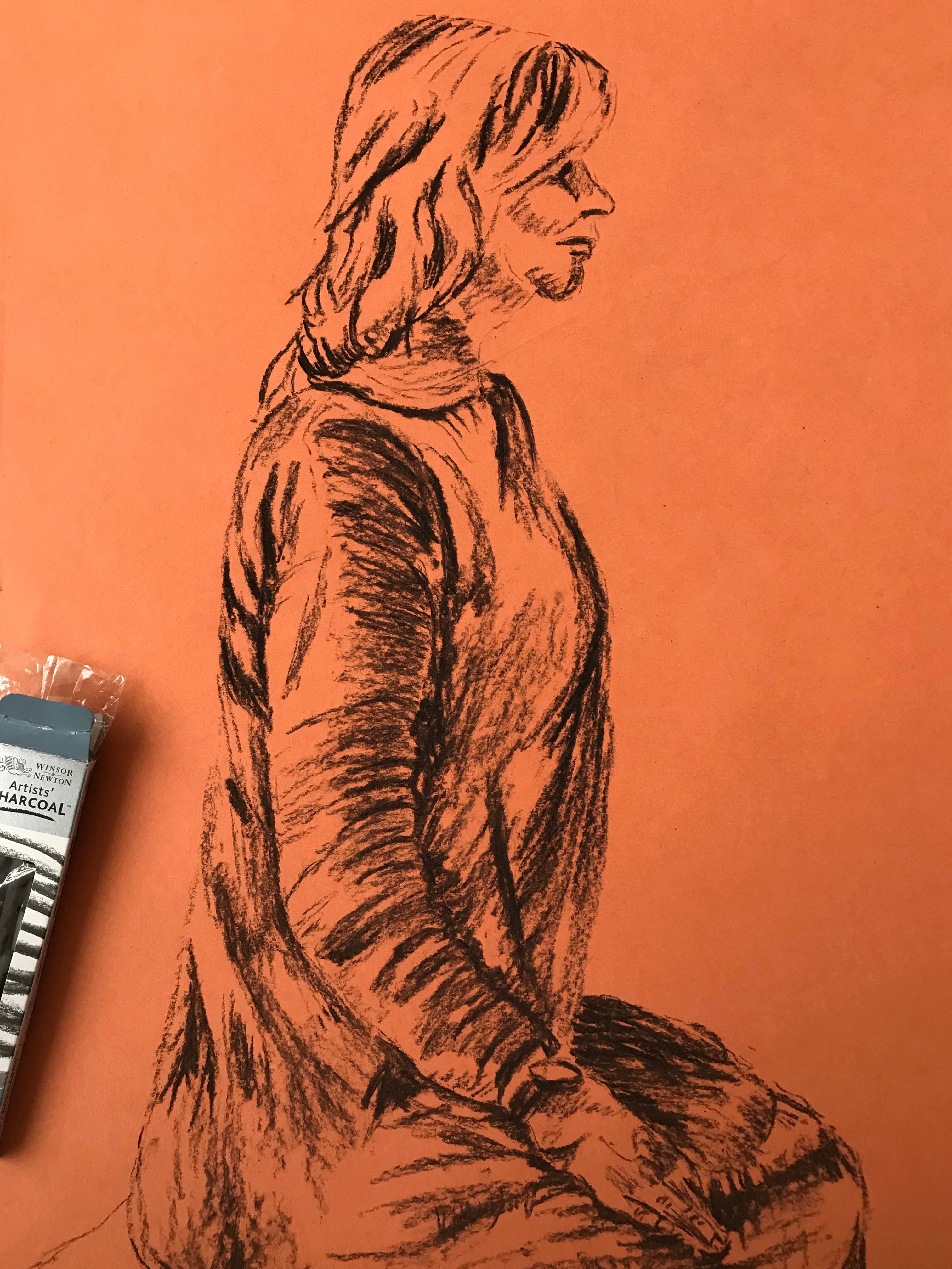Charcoal drawing of a woman sitting side-on.