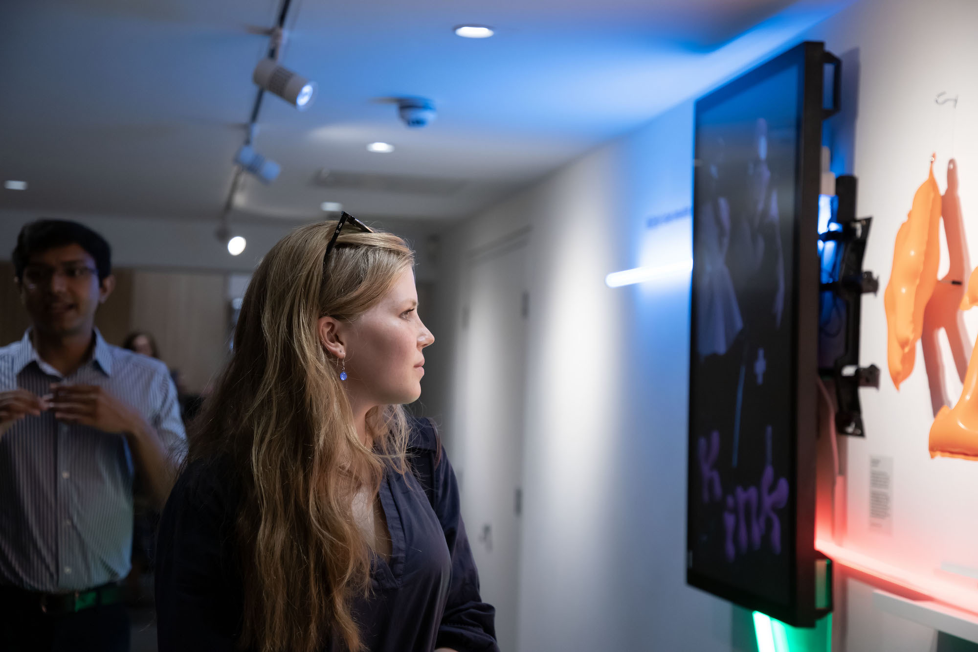 A visitor looking at an exhibit at TheGallery during the 2023 Snapshot shows.