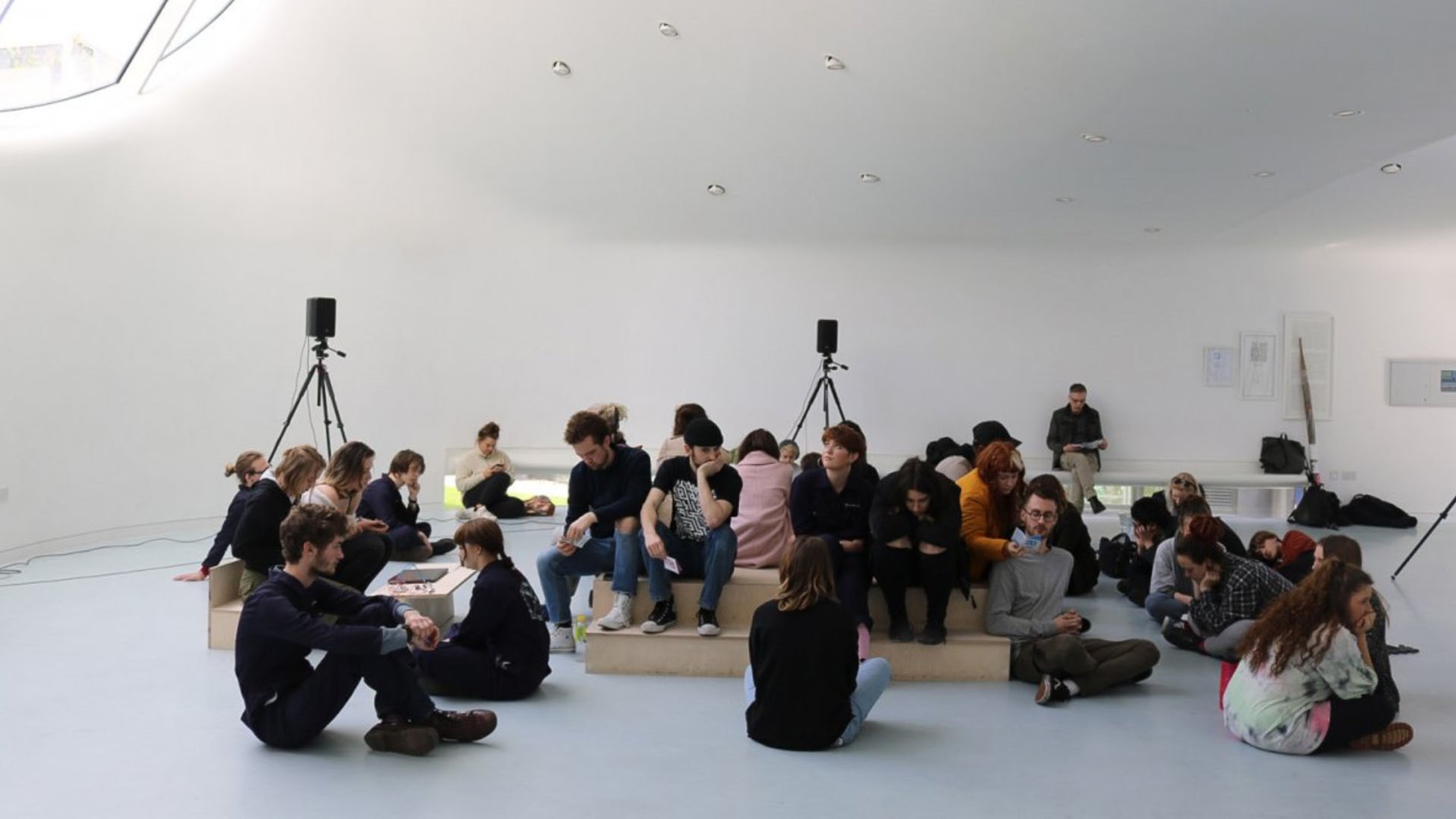 A large group of students sat in the CRAB studio