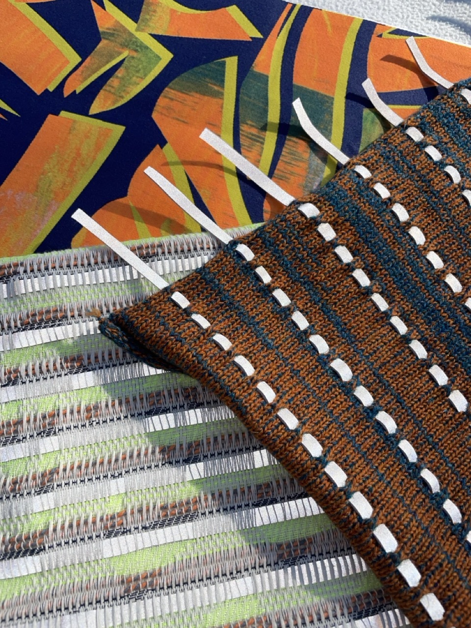 Collection of colourful patterned fabrics.