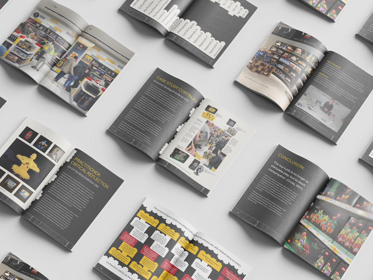 Multiple open books and magazines scattered on white surface, showing colourful pages with text, images, and geometric patterns.