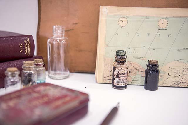 map with bottle sin front of it