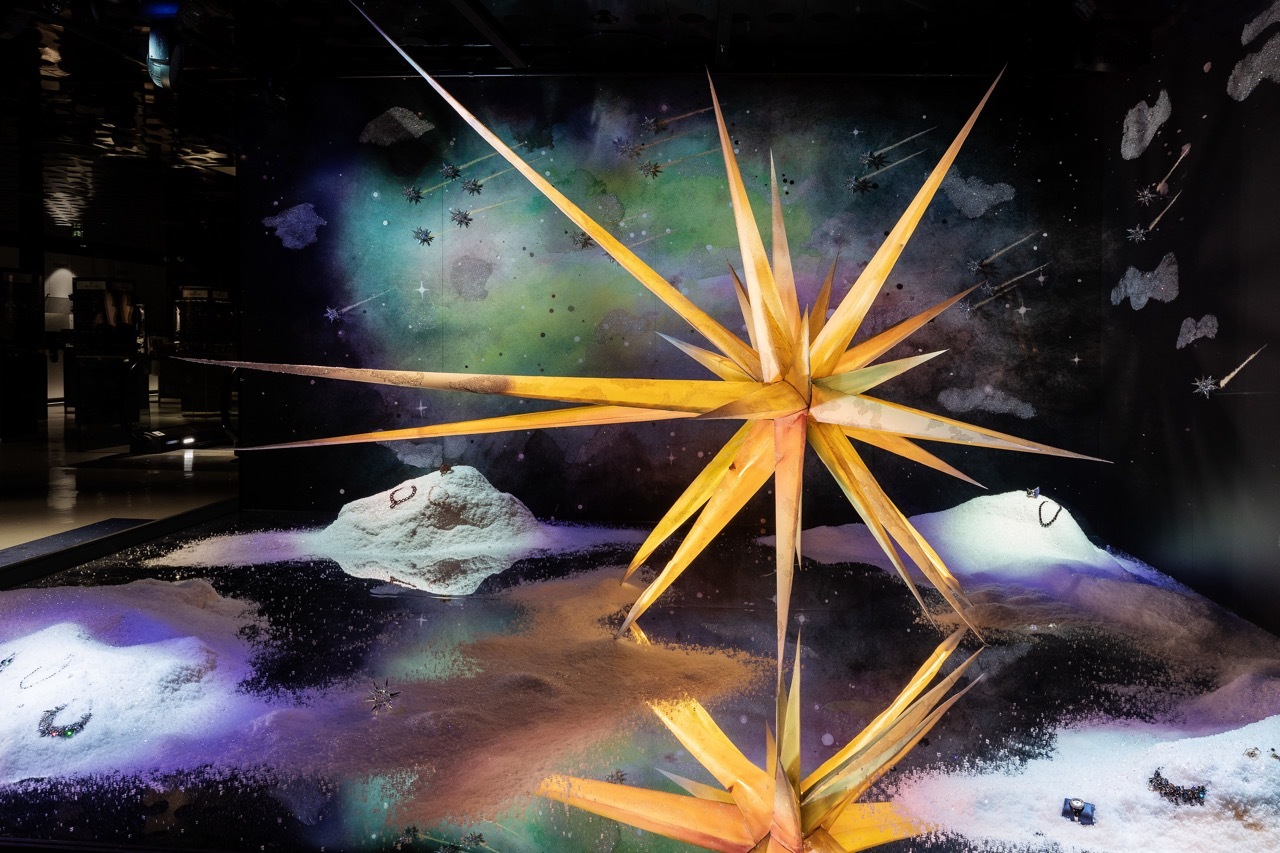 A large, pointy star on a space-style background.