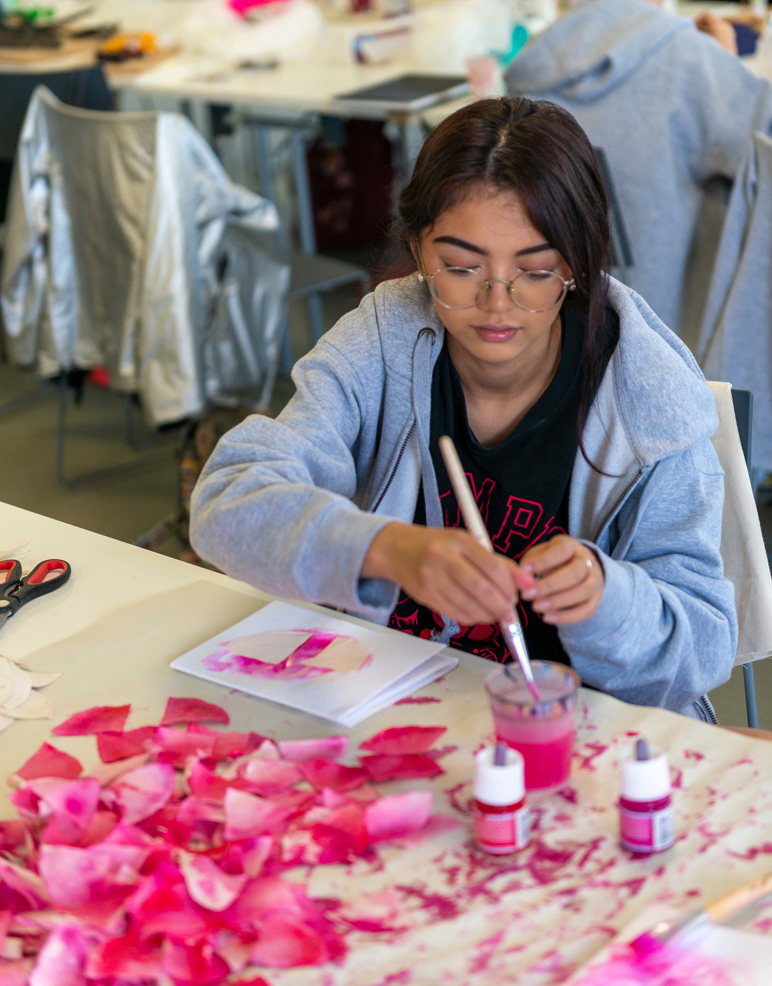 Student working on a fashion piece