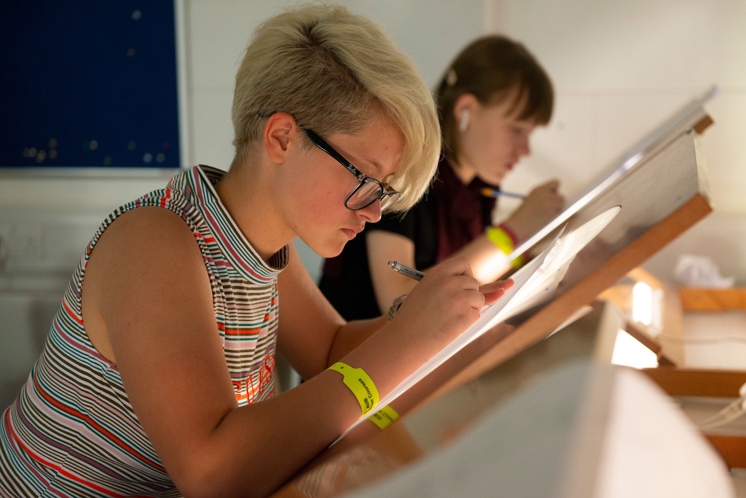 Student working at lightbox