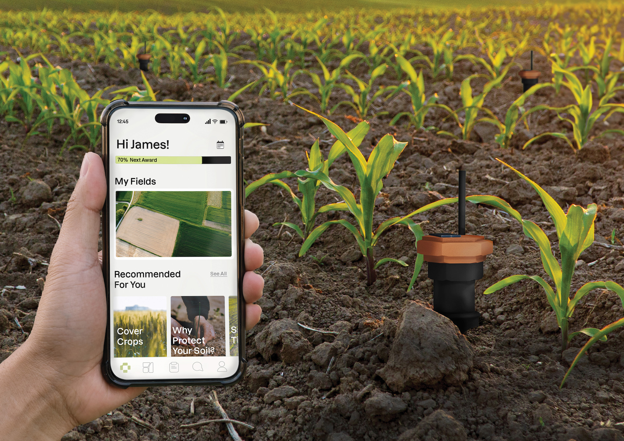 A person holds a smartphone with the Terra Hex app open on the screen. Crops in a field are visible in the background. Text reading "RSA Student Design Awards Highly Commended 2024" appears in the bottom right corner.