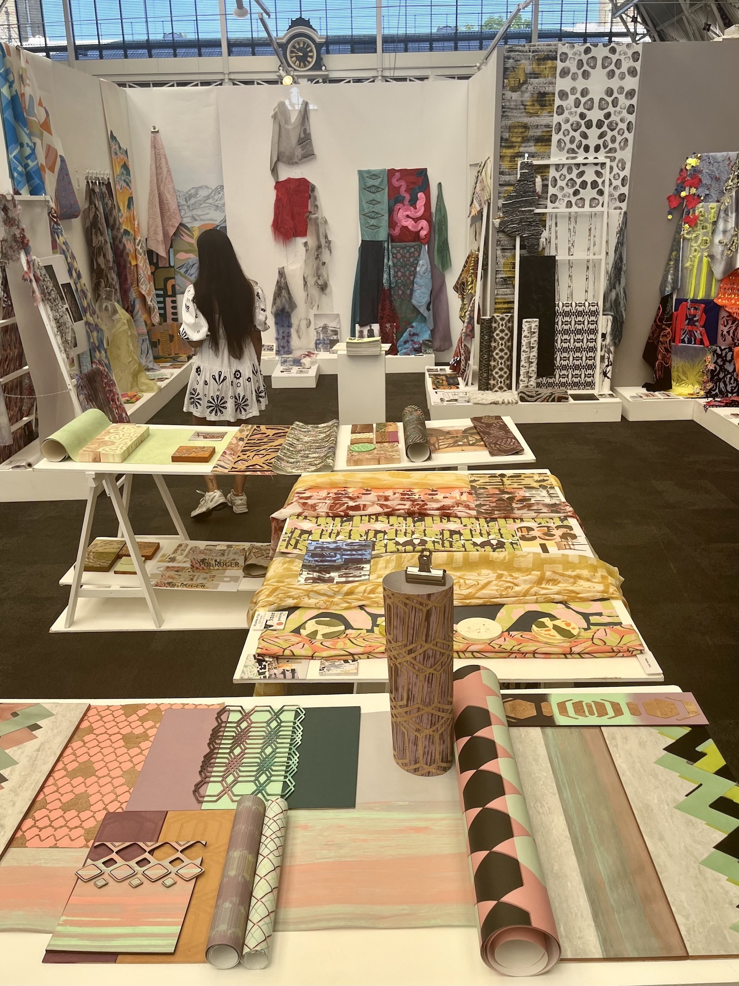 Various samples of BA (Hons) Textiles work on display at the AUB stand at the 2024 New Designers event.