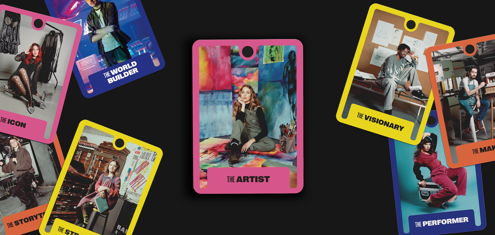 Colourful tarot-style cards with bright pink, yellow, and blue borders scattered on black background, featuring people and text labels.