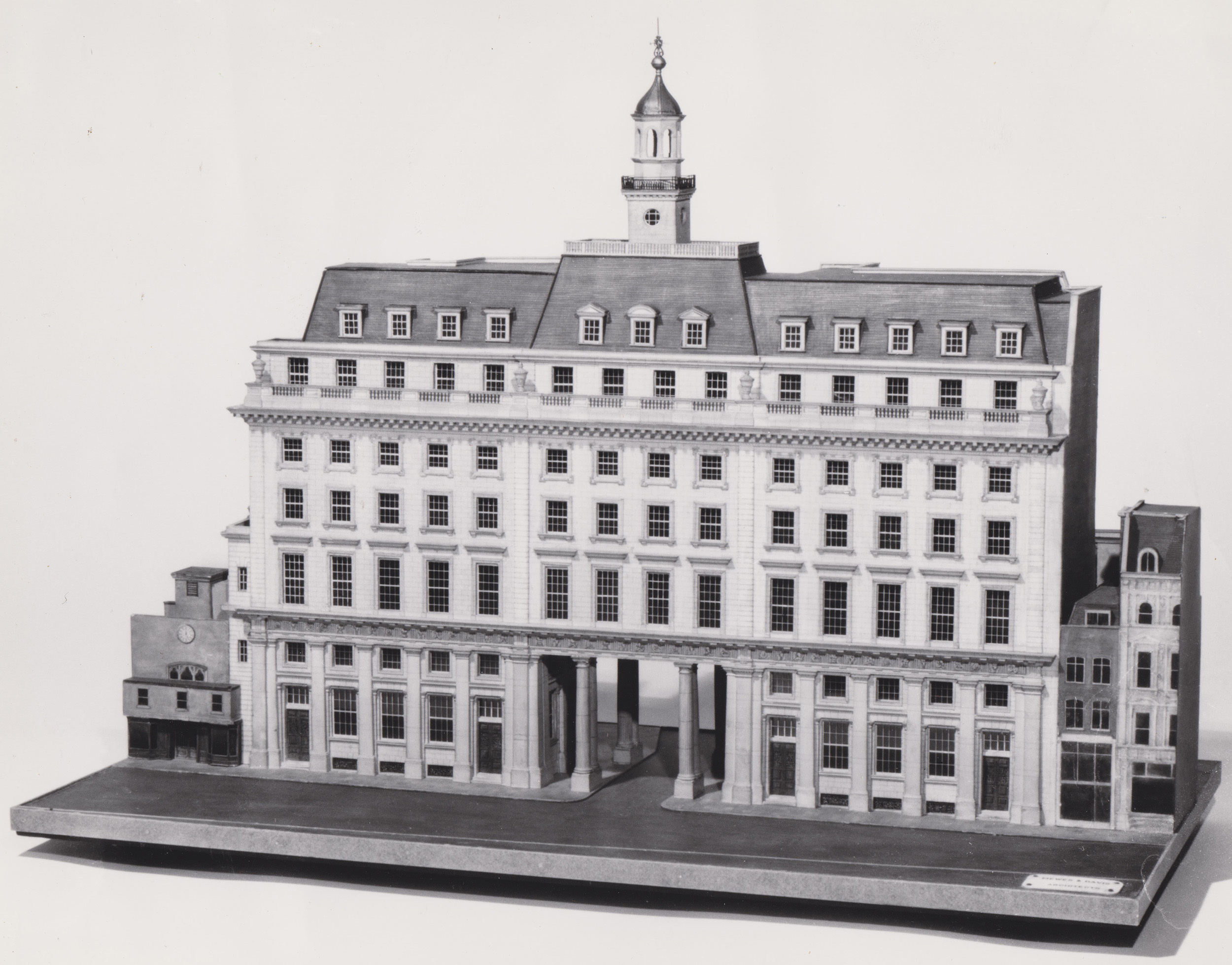 Model of a large six-storey building with a small tower in the centre of the roof.