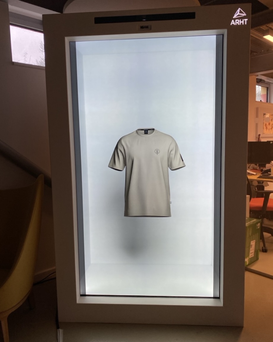 Hologram projection of 3D beige t-shirt render in Holobox, on a white background.