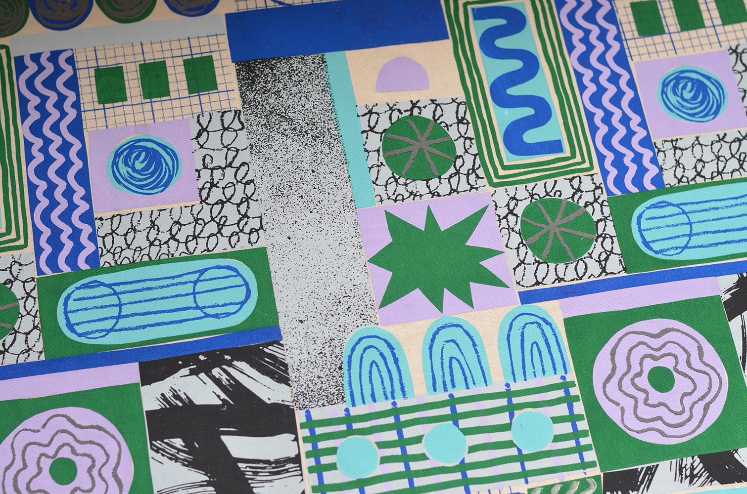 Blue, green, purple and white printed fabric designs