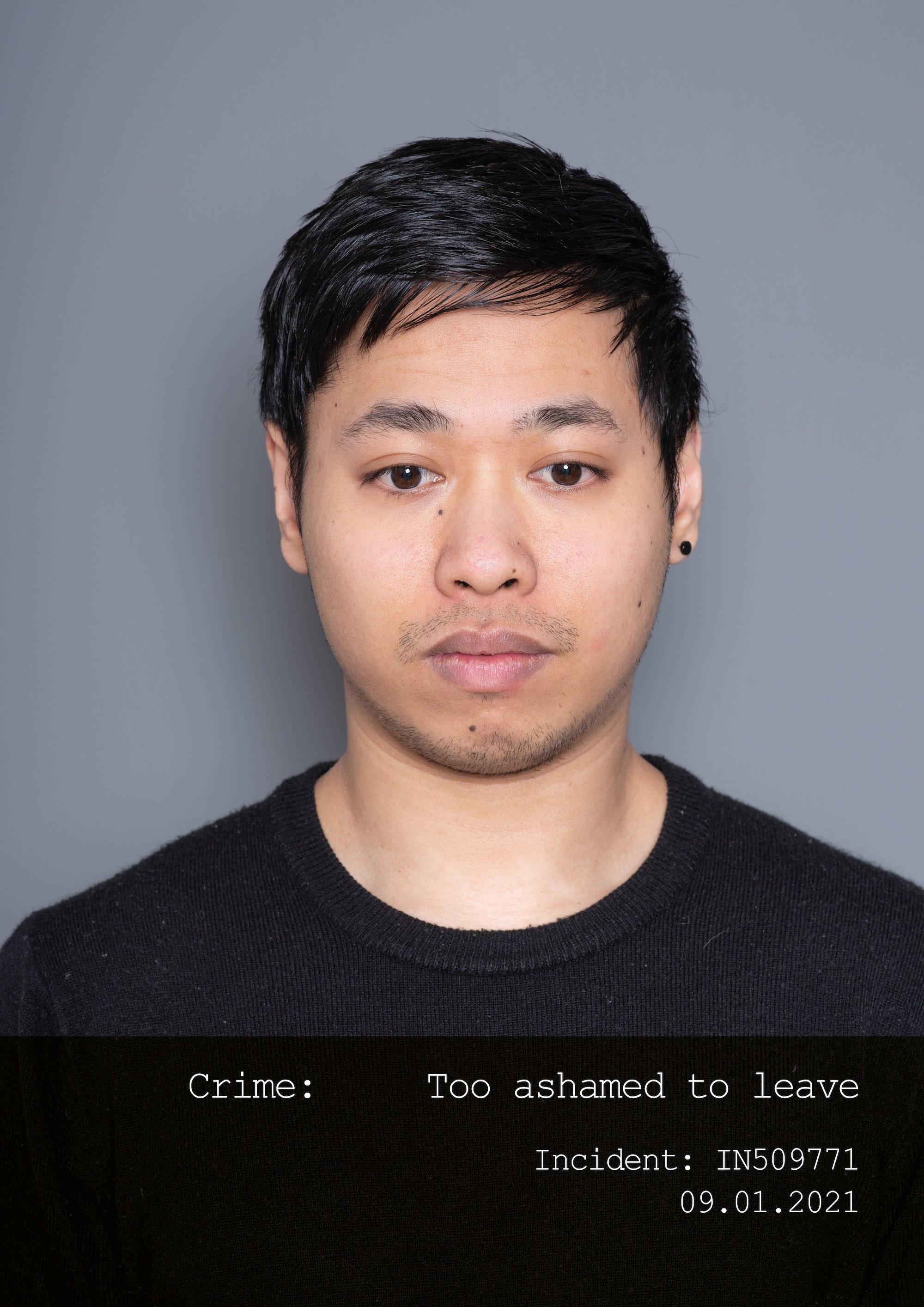 Mugshot of a man with a text of his "crime"