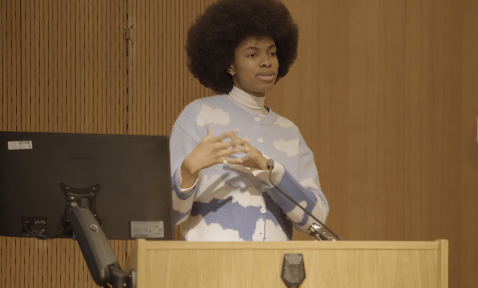 BA (Hons) Commercial Photography graduate U. Emka-Okafor giving a talk at an Open Day at AUB.