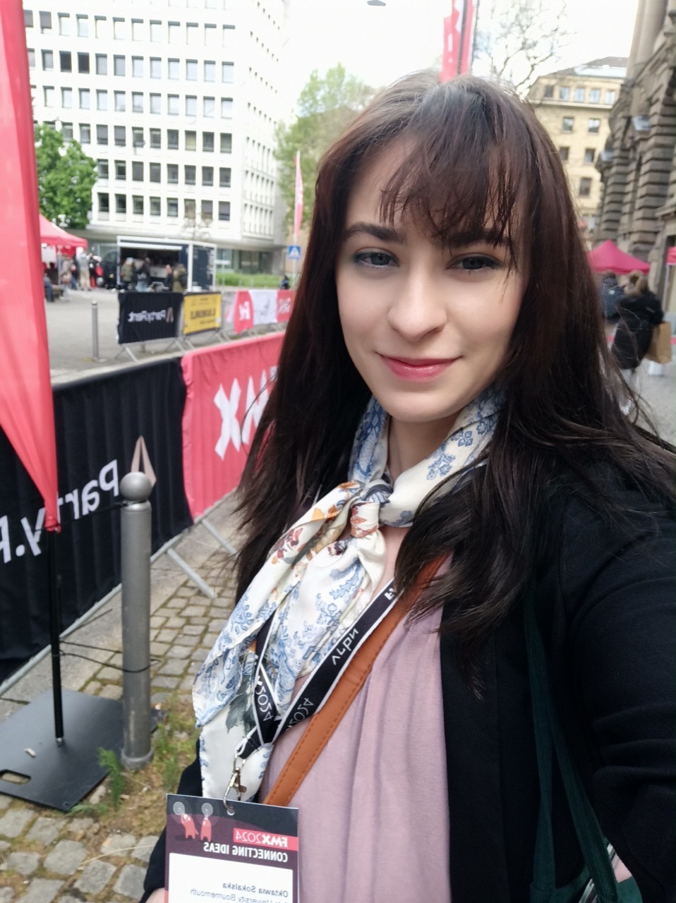 Oktawia with AUB at FMX Stuttgart, outdoors selfie.
