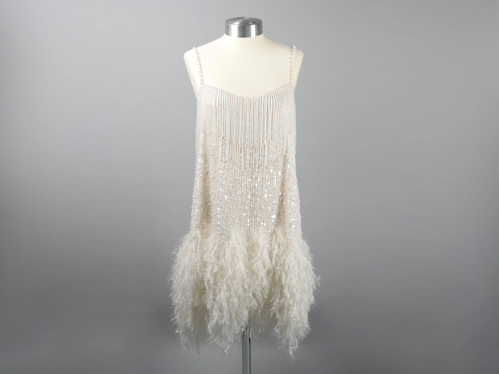 A white faux feather trim dress