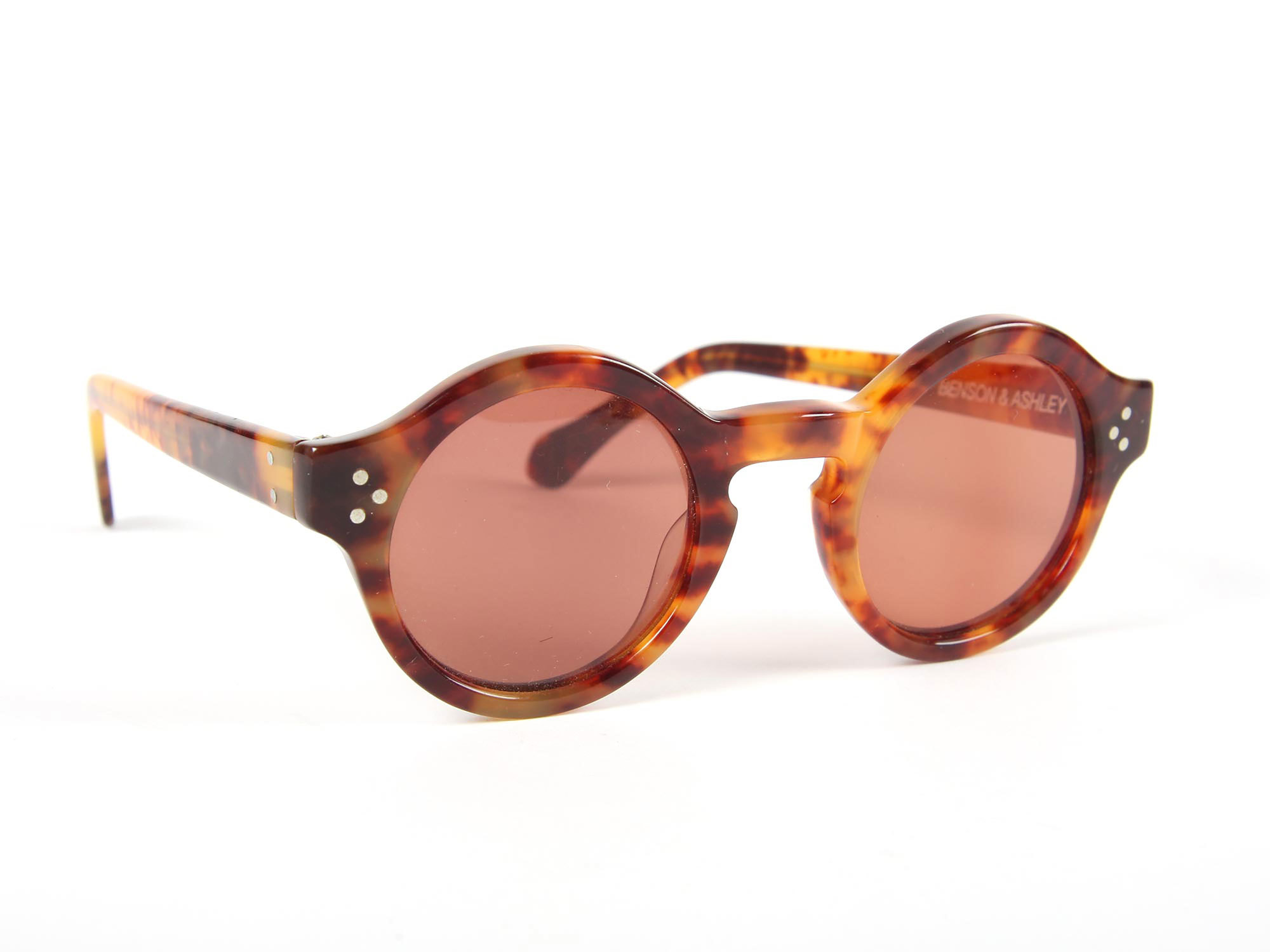 Sunglasses made from a material that resembles tortoiseshell
